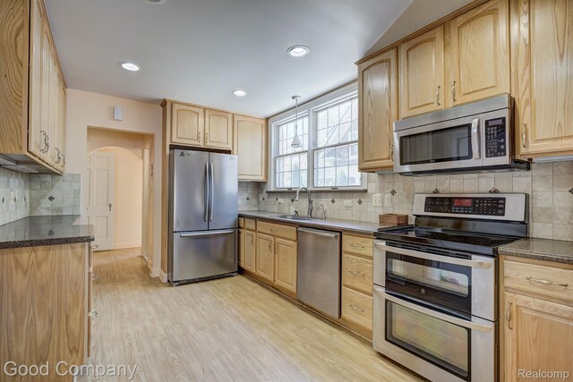 20 Oxford Blvd, Pleasant Ridge, MI 48069 - kitchen with appliances with stainless steel finishes, light brown cabinets, backsplash, light wood finished floors, and recessed lighting
