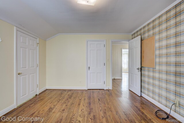 20 Oxford Blvd, Pleasant Ridge, MI 48069 - unfurnished bedroom with wood finished floors, ornamental molding, and vaulted ceiling