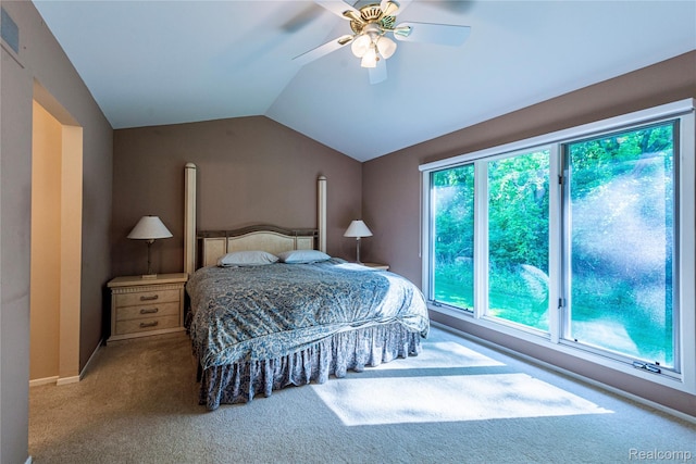 6760 Oyster Cv, West Bloomfield, MI 48323 - carpeted bedroom featuring vaulted ceiling and a ceiling fan