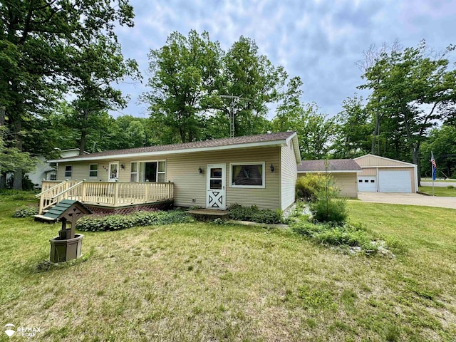 449 Noric Dr, Roscommon, MI 48653 - view of front of property featuring a wooden deck, an outbuilding, a front lawn, and a garage