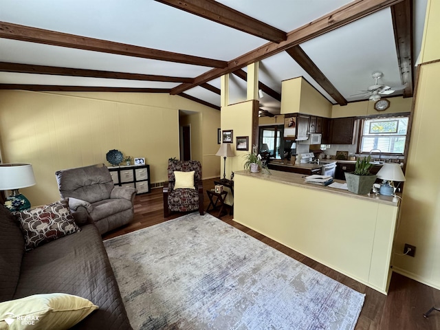 449 Noric Dr, Roscommon, MI 48653 - living area featuring dark wood-type flooring and ceiling fan