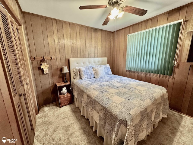 449 Noric Dr, Roscommon, MI 48653 - bedroom featuring light carpet, wood walls, and ceiling fan