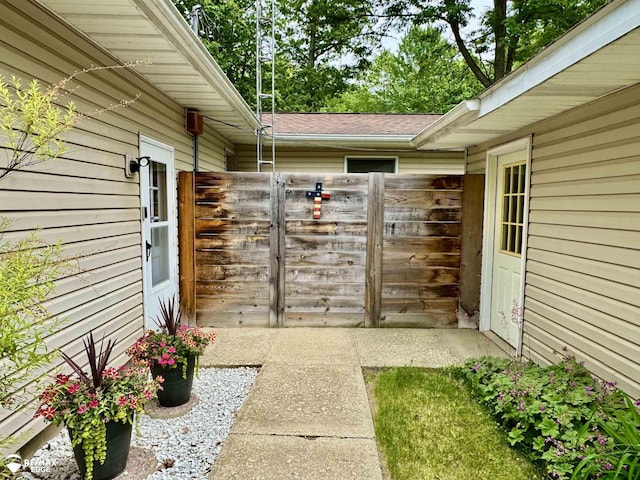 449 Noric Dr, Roscommon, MI 48653 - doorway to property with a shingled roof