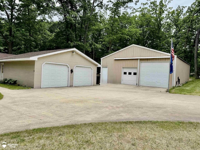 449 Noric Dr, Roscommon, MI 48653 - detached garage with view of scattered trees