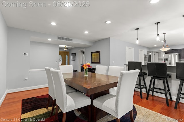 2138 Metzner Rd, Commerce Twp, MI 48390 - dining space featuring recessed lighting and wood finished floors