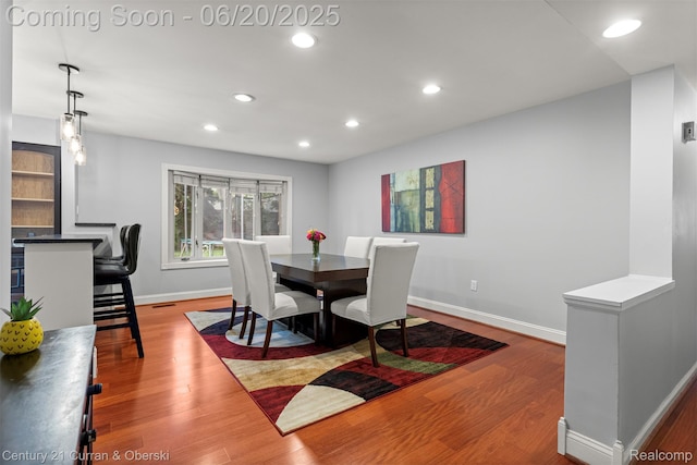 2138 Metzner Rd, Commerce Twp, MI 48390 - dining room featuring wood finished floors and recessed lighting