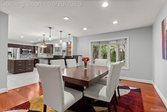 2138 Metzner Rd, Commerce Twp, MI 48390 - dining room with light wood-style floors and recessed lighting
