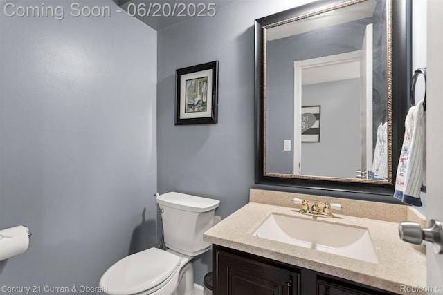 2138 Metzner Rd, Commerce Twp, MI 48390 - bathroom featuring toilet and vanity