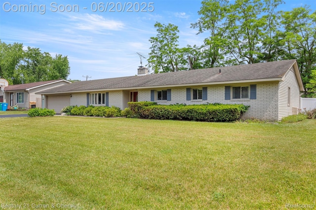 2138 Metzner Rd, Commerce Twp, MI 48390 - ranch-style home featuring a garage, a front lawn, and a chimney