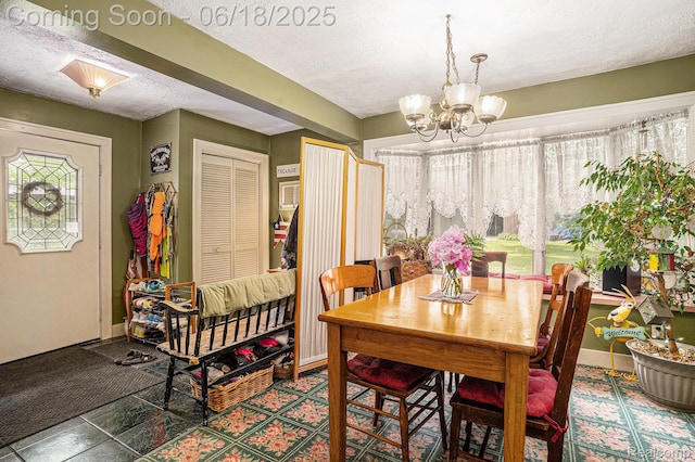 44988 52nd St, Lawrence, MI 49064 - dining space featuring a chandelier and a textured ceiling
