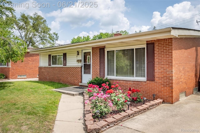 8311 Gulley St, Taylor, MI 48180 - single story home with brick siding, a front lawn, and a chimney