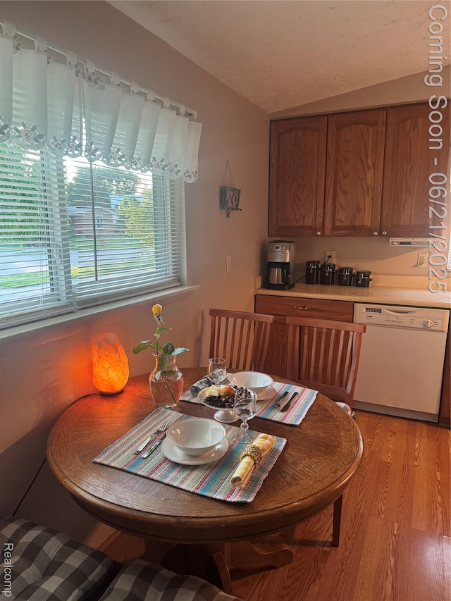 8311 Gulley St, Taylor, MI 48180 - dining room with vaulted ceiling and light wood finished floors