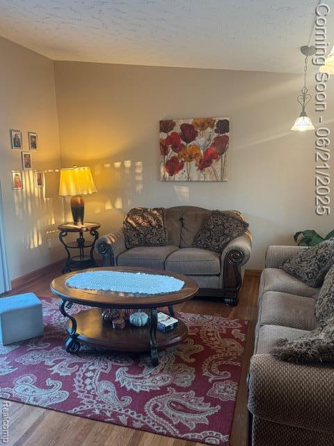 8311 Gulley St, Taylor, MI 48180 - living area with wood finished floors
