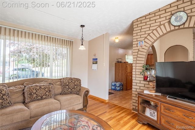 8311 Gulley St, Taylor, MI 48180 - living room with light wood-type flooring and baseboards