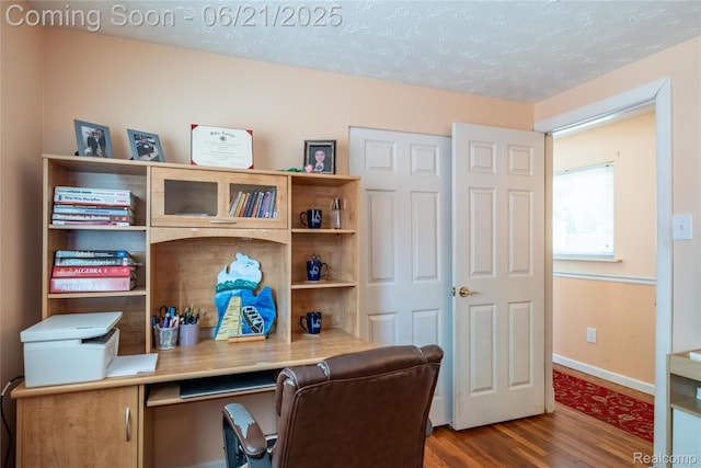 8311 Gulley St, Taylor, MI 48180 - home office with wood finished floors and a textured ceiling