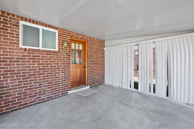 22902 Olmstead St, Dearborn, MI 48124 - view of exterior entry featuring brick siding