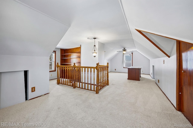 22902 Olmstead St, Dearborn, MI 48124 - bonus room featuring carpet floors, vaulted ceiling, healthy amount of natural light, and a ceiling fan