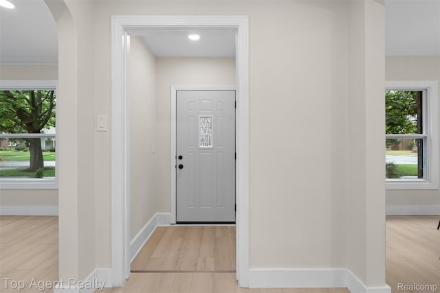 14638 Greenview Rd, Detroit, MI 48223 - entrance foyer with wood finished floors, arched walkways, and recessed lighting