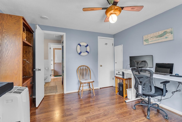 8856 Kingsley Dr, Onsted, MI 49265 - office space featuring wood finished floors and ceiling fan