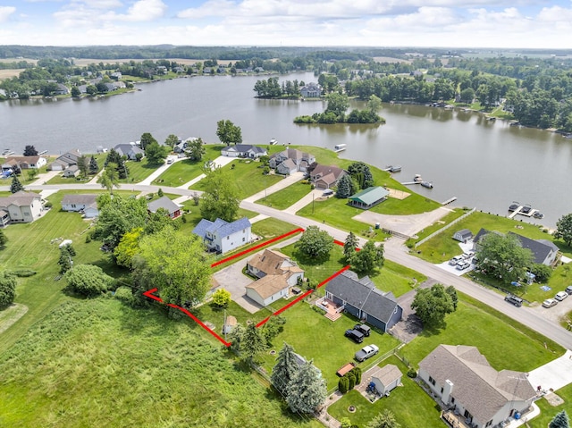 8856 Kingsley Dr, Onsted, MI 49265 - aerial view of residential area with a large body of water and property parcel outlined