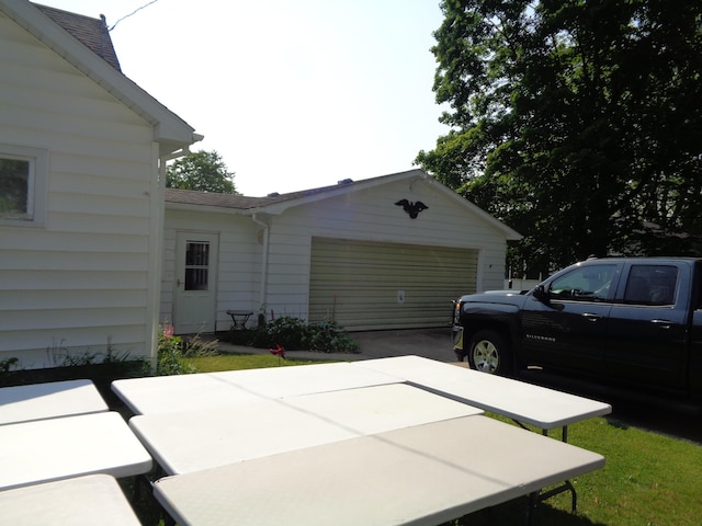 205 Prentiss St, Allen, MI 49227 - view of property exterior with concrete driveway and an attached garage
