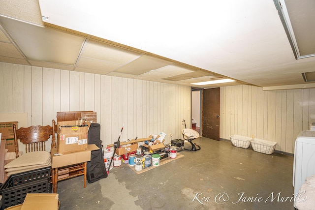 6072 Del Cano Dr SE, Grand Rapids, MI 49546 - below grade area featuring wooden walls and washer / dryer