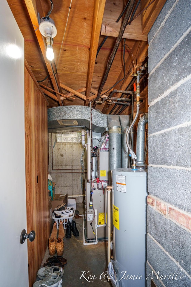 6072 Del Cano Dr SE, Grand Rapids, MI 49546 - utility room with water heater and heating unit