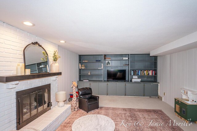 6072 Del Cano Dr SE, Grand Rapids, MI 49546 - living room with a fireplace and carpet flooring