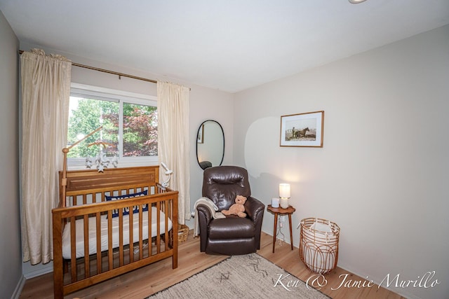 6072 Del Cano Dr SE, Grand Rapids, MI 49546 - living area with wood finished floors and baseboards