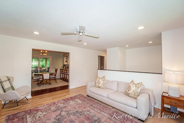 6072 Del Cano Dr SE, Grand Rapids, MI 49546 - living room with wood finished floors, recessed lighting, and ceiling fan