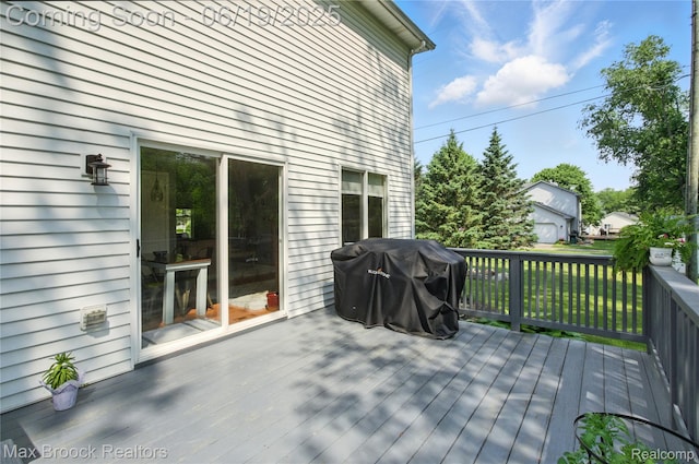 7950 Sandmar Ln, Davisburg, MI 48350 - wooden deck with a grill