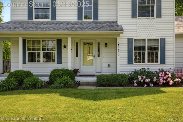 7950 Sandmar Ln, Davisburg, MI 48350 - view of front of home featuring a shingled roof, a front yard, and covered porch