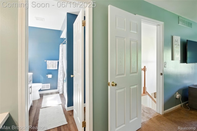 7950 Sandmar Ln, Davisburg, MI 48350 - hallway featuring an upstairs landing and baseboards