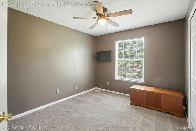 7950 Sandmar Ln, Davisburg, MI 48350 - unfurnished office with a ceiling fan and carpet