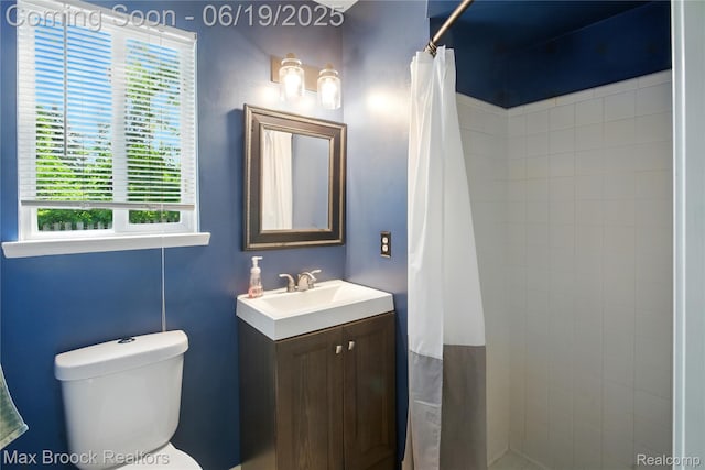 7950 Sandmar Ln, Davisburg, MI 48350 - bathroom with vanity, healthy amount of natural light, and a tile shower