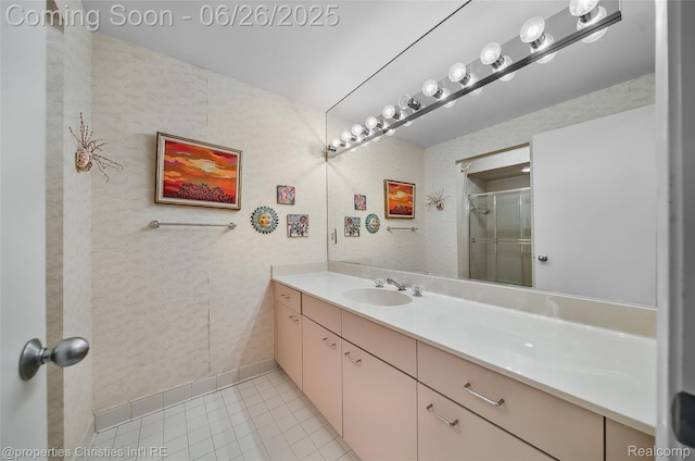 7569 Danbury Cir W, Bloomfield, MI 48322 - full bathroom featuring vanity, tile patterned floors, and a shower with shower door