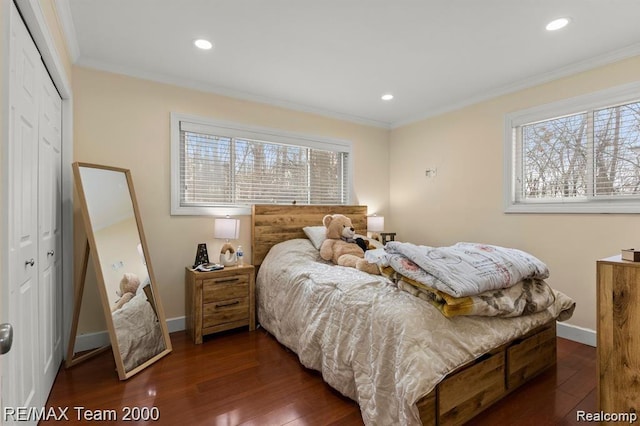 28045 W Greenmeadow Cir, Farmington Hills, MI 48334 - bedroom with dark wood-style flooring, ornamental molding, a closet, and recessed lighting