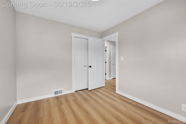 8171 Marian St, Warren, MI 48093 - unfurnished bedroom with wood finished floors and a closet
