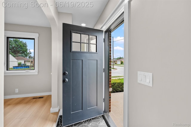 8171 Marian St, Warren, MI 48093 - entryway featuring wood finished floors and arched walkways