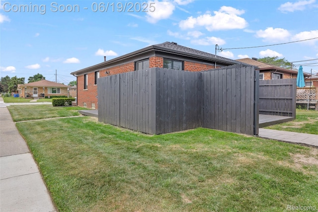 8171 Marian St, Warren, MI 48093 - view of home's exterior featuring brick siding