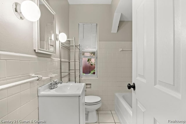 13631 Vassar Ave, Detroit, MI 48235 - full bath featuring tile walls, vanity, tile patterned flooring, and a wainscoted wall