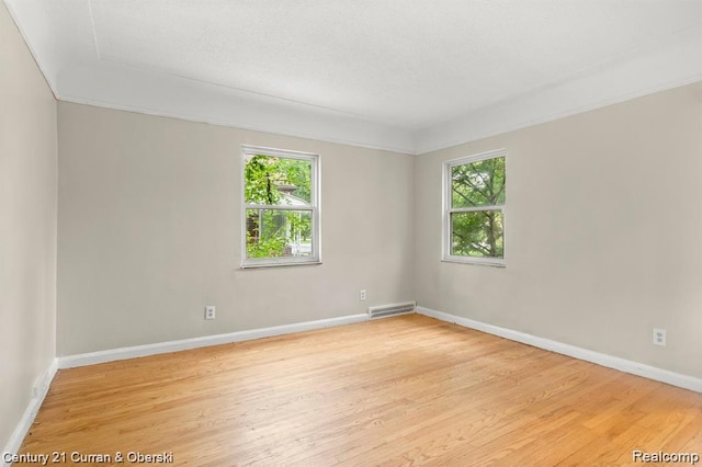 13631 Vassar Ave, Detroit, MI 48235 - spare room with light wood-style floors and baseboards