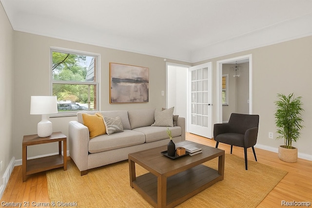 13631 Vassar Ave, Detroit, MI 48235 - living room with light wood finished floors and crown molding