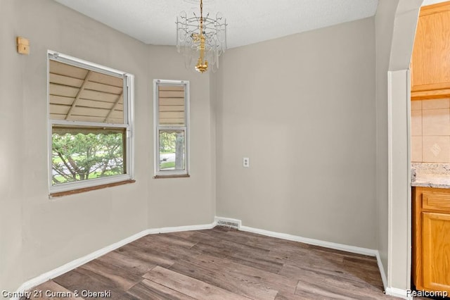 13631 Vassar Ave, Detroit, MI 48235 - unfurnished dining area featuring wood finished floors and baseboards