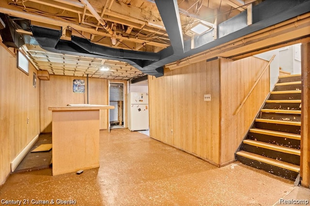 13631 Vassar Ave, Detroit, MI 48235 - finished basement featuring freestanding refrigerator, a bar, stairway, and wooden walls