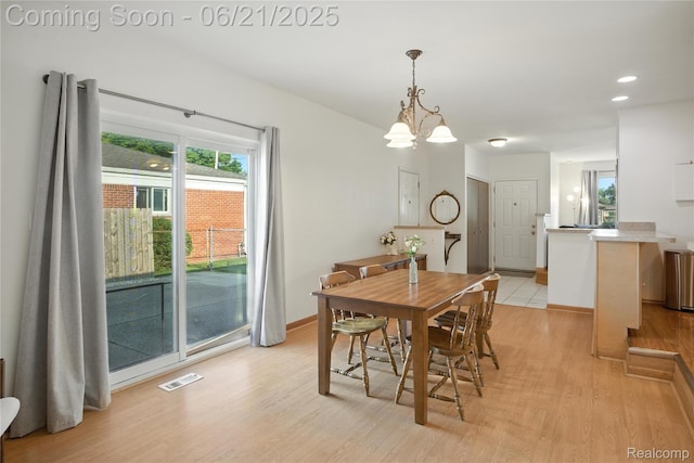 13647 Murthum Ave, Warren, MI 48088 - dining space featuring light wood finished floors, a chandelier, and recessed lighting