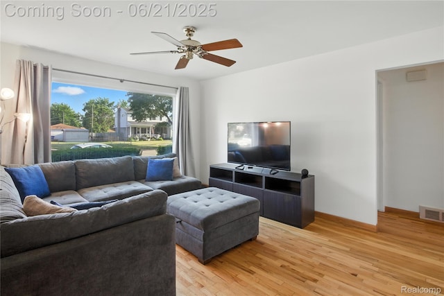 13647 Murthum Ave, Warren, MI 48088 - living area featuring light wood-type flooring and a ceiling fan