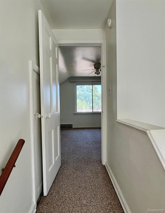 17041 Henry St, Melvindale, MI 48122 - hall with vaulted ceiling, carpet flooring, and an upstairs landing