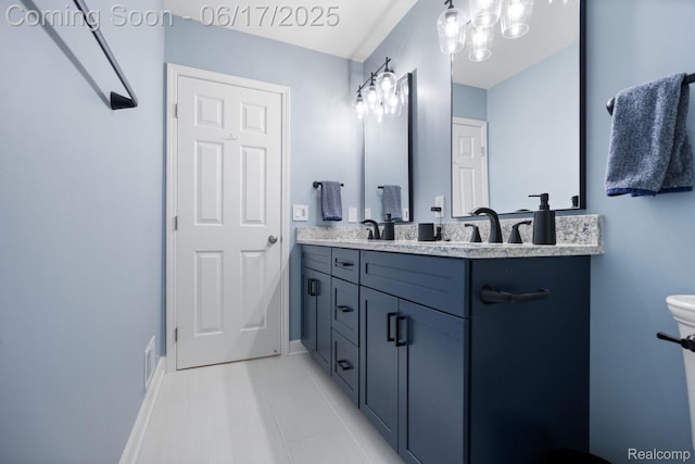 24462 Christian Dr, Flat Rock, MI 48134 - full bath featuring double vanity and tile patterned flooring