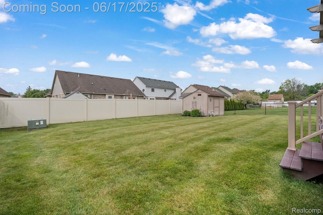 24462 Christian Dr, Flat Rock, MI 48134 - fenced backyard with a storage shed and a residential view